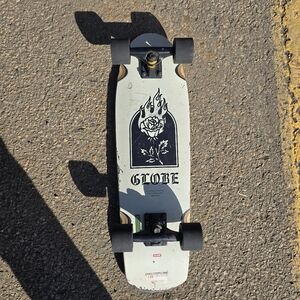 Globe Trooper Off-White Rose 27" cruiser skateboard.